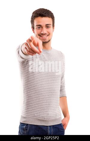 Beau jeune homme sur vous, isolé sur fond blanc Banque D'Images