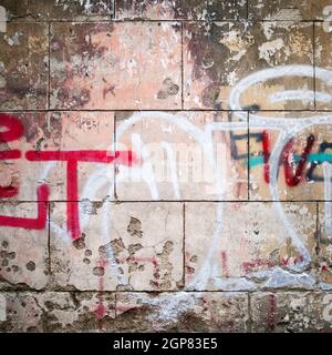 Extreme close up of colorful graffiti sur mur de béton. Banque D'Images