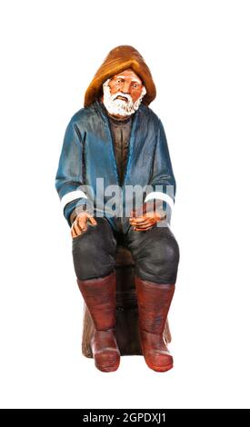 Figure en plastique d'un vieux pêcheur à la barbe blanche Banque D'Images