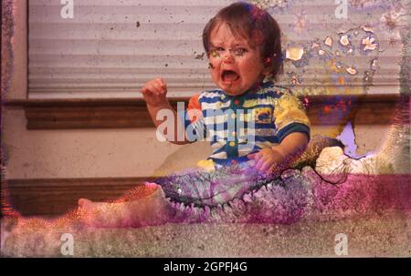 Austin Texas USA, 1994: Bébé garçon de neuf mois apprenant à ramper et montre la frustration.©Bob Daemmrich Banque D'Images