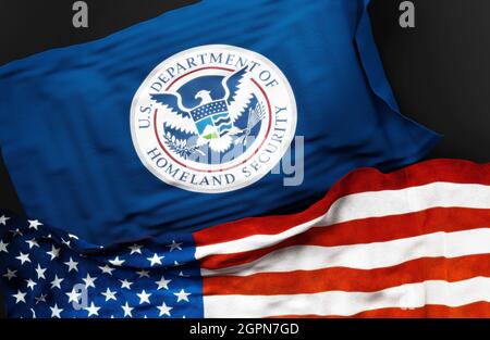 Drapeau du Département de la sécurité intérieure des États-Unis avec un drapeau des États-Unis d'Amérique comme symbole d'un lien entre eux, Banque D'Images
