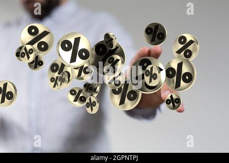 rendu 3d des symboles de pourcentage de noir sur des cercles beiges touchés par une main sur un fond blanc Banque D'Images