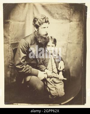 Le révérend James Langton Clark et son fils Charles (Robin), 1864. Imprimé argent en couleur albumine. Banque D'Images