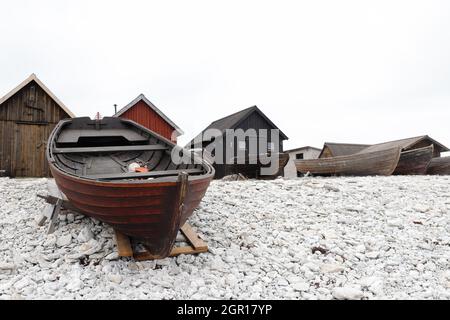 Station de pêche Helgumannen avec bateau de pêche sur l'île de Faro, province suédoise de Gotland. Banque D'Images