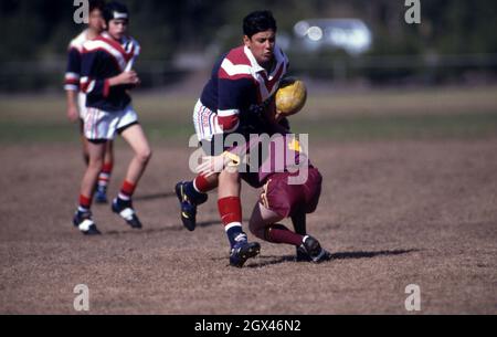 JEU JUNIOR DE FOOTBALL EN COURS, NOUVELLE-GALLES DU SUD, AUSTRALIE. Banque D'Images