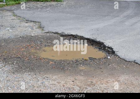 terrain de stationnement boueux Banque D'Images