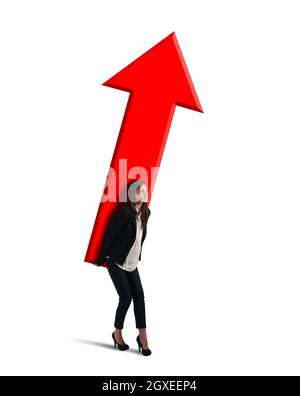 Femme d'affaires tient une grande flèche rouge. Concept de croissance et de réussite de l'entreprise Banque D'Images