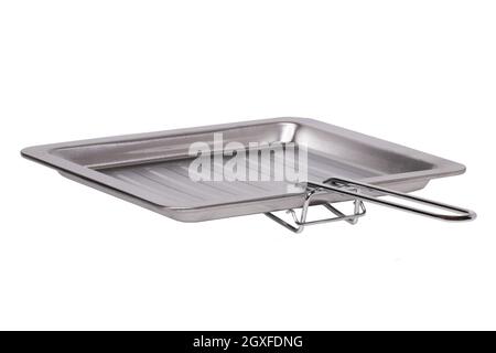 Poignée métallique pour retirer la plaque de cuisson ou la grille du four, isolée sur un fond blanc. Macro. Banque D'Images