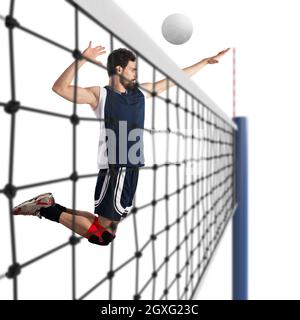 Le joueur de volley-ball frappe le saut de balle Banque D'Images