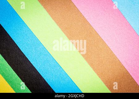 Arrière-plan multicolore à partir d'un papier de différentes couleurs. Textures abstraites de papier colorées et éclatantes. Banque D'Images
