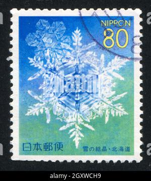 JAPON - VERS 1999: Timbre imprimé par le Japon montre le flocon de neige, vers 1999 Banque D'Images