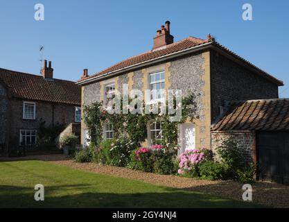 Maison de campagne typique en pierre de pierre de Norfolk architecture à CLEY à côté du village de la mer à Norfolk Angleterre Royaume-Uni Banque D'Images