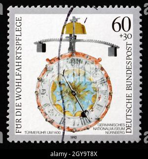 ALLEMAGNE - VERS 1992: Un timbre imprimé en Allemagne montre Turret, c.1400, Antique Clock, vers 1992 Banque D'Images