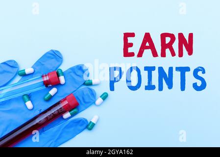 Affiche affichant gagner des points, mot écrit sur un fonds récompensé automatiquement après l'achat de tout produit prescrit Medicine Vitamines et minéraux PIL Banque D'Images
