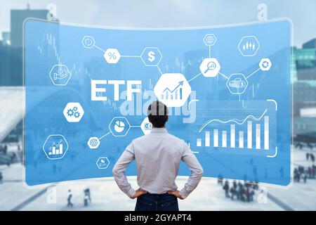 ETF placement de fonds négociés en bourse avec un investisseur établissant un portefeuille d'actifs financiers sur le marché, tels que des actions, des obligations, des matières premières, des devises.C Banque D'Images
