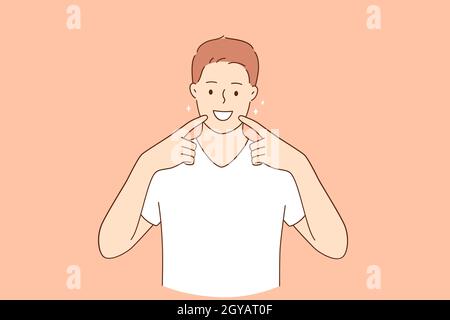 Concept de santé dentaire et d'hygiène. Jeune homme souriant beau dans des vêtements décontractés debout souriant gai montrant des dents blanches saines et la bouche Banque D'Images