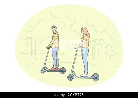 Mode de vie actif sain, sport, loisir concept de passe-temps.Jeune couple heureux appréciant de conduire des scooters ensemble dans le parc sur l'illustration d'été.Climatisation familiale Banque D'Images