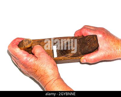 Outil de menuiserie plan en bois sur fond blanc. Artisan. Profession de menuisier. Traitement du bois. Outil de travail du plan. Image d'arrière-plan. Plac Banque D'Images