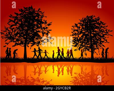 Silhouettes de personnes marchant dans la campagne Banque D'Images