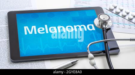Le mot Melanoma sur l'écran d'une tablette Banque D'Images