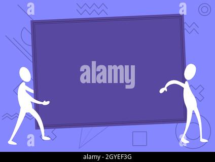 Deux collègues debout portant un grand tableau blanc montrant Unity. Banque D'Images