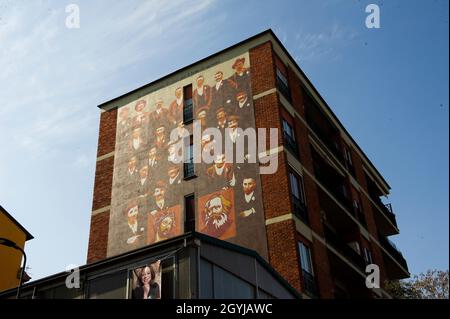 Europe, Italie, Lombardie, Milan, quartier Ortica.Art de rue avec des peintures murales de l'or.Me.Projet d'Ortica Memoria.Le travail consacré à la coopération. Banque D'Images