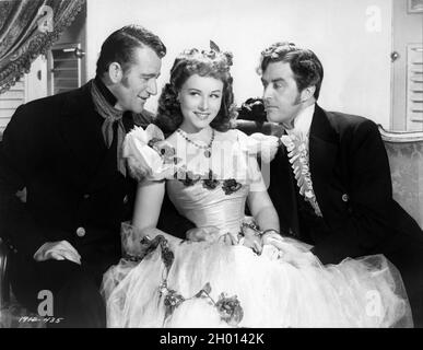 JOHN WAYNE PAULETTE GODDARD et RAY MILLAND Publicité Portrait in REAP THE WILD WIND 1942 réalisateur CECIL B. Demille basé sur samedi soir Post histoire par Thelma Strabel scénario Alan le May Charles Bennett et Jesse Lasky Jr. Musique Victor Young costume design Natalie Visart Paramount images Banque D'Images