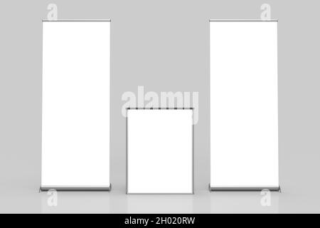 Deux bandeaux blancs Pullup exposition et table de point de vente au milieu isolé sur fond gris, vue de face, pour maquette et illustrati Banque D'Images