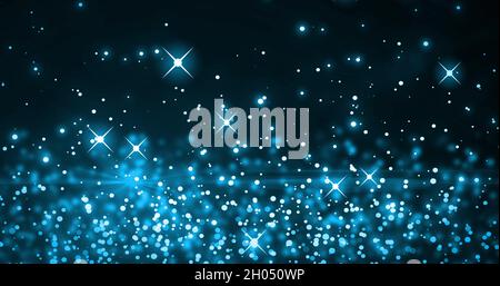 Image de plusieurs taches bleues brillantes de lumière se déplaçant dans un mouvement hypnotique sur fond bleu Banque D'Images