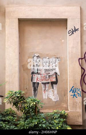 Affiche d'art de rue coupée en forme dans le quartier Trastevere de Rome, Italie Banque D'Images