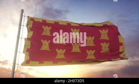 Drapeau du Grand Manchester, Angleterre, agitant dans le vent, le ciel et le soleil fond. 3d rendu Banque D'Images