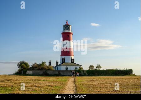 Le phare de Happisburgh est situé dans un domaine clos sur la côte nord de Norfolk, en Angleterre.C'est le plus ancien d'East Anglia. Banque D'Images