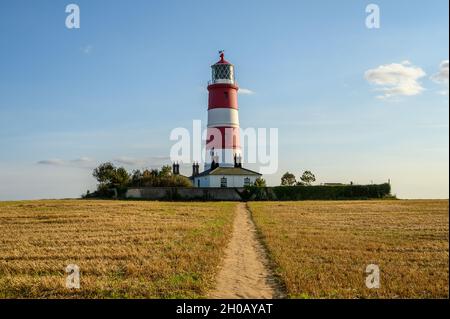 Le phare de Happisburgh est situé dans un domaine clos sur la côte nord de Norfolk, en Angleterre.C'est le plus ancien d'East Anglia. Banque D'Images