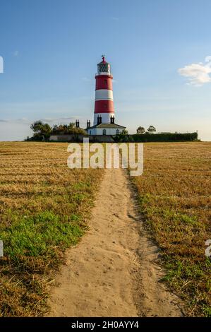 Le phare de Happisburgh est situé dans un domaine clos sur la côte nord de Norfolk, en Angleterre.C'est le plus ancien d'East Anglia. Banque D'Images