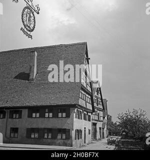 Dans Fachwerkhaus Dinkelsbühl, Deutschland 1930 er Jahre. Maison à colombages à Dinkelsbuehl, Allemagne 1930. Banque D'Images