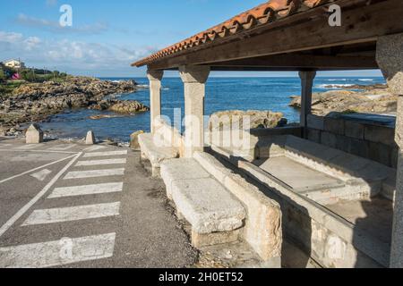 Ancien lavoir public, lavoir en bord de mer à a Guarda, Galice, Espagne. Banque D'Images