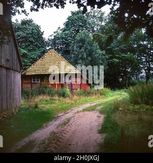 Ancienne ferme à pans de bois et grange de style Ammerland, Allemagne, Basse-Saxe, Ammerland Banque D'Images