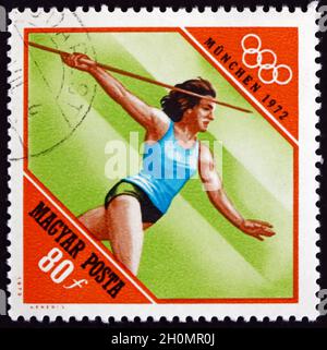 HONGRIE - VERS 1972: Un timbre imprimé en Hongrie montre Javelin, Athlétisme, 20e Jeux Olympiques, Munich, vers 1972 Banque D'Images