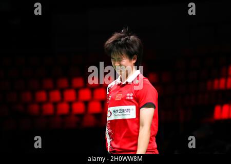 Aarhus, Danemark.14 octobre 2021.Il Bingjiao, de Chine, réagit au match des femmes célibataires contre Hung Yi-Ting, de Taipei chinois, lors d'un quart de finale au tournoi de badminton de la coupe Uber à Aarhus, au Danemark, le 14 octobre 2021.Credit: Zhang Cheng/Xinhua/Alay Live News Banque D'Images