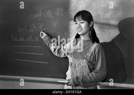 Jeune femme chinoise au blackboard MR - modèle libéré Banque D'Images