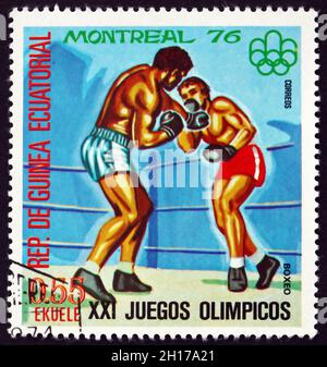 GUINÉE ÉQUATORIALE - VERS 1978 : un timbre imprimé en Guinée équatoriale montre la boxe, les Jeux Olympiques d'été 1976, Montréal, vers 1978 Banque D'Images