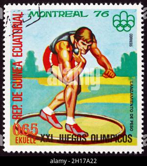 GUINÉE ÉQUATORIALE - VERS 1978 : un timbre imprimé en Guinée équatoriale montre Shot Put, Jeux olympiques d'été 1976, Montréal, vers 1978 Banque D'Images