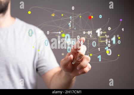 Gros plan du doigt d'un homme touchant des lignes et des points de connexion, visualisation des Big Data Banque D'Images