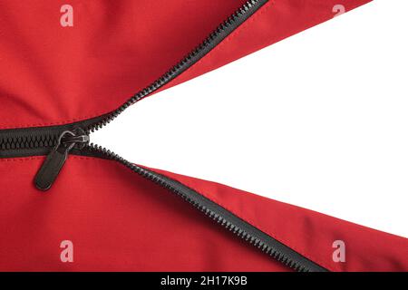 La fermeture éclair n'est pas complètement ouverte sur la veste rouge Banque D'Images