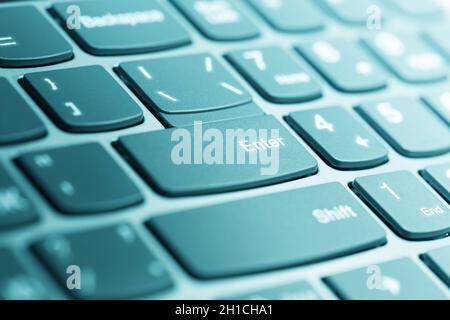 Clavier d'ordinateur portable.Photo avec faible profondeur de champ, ton dans l'eau Banque D'Images