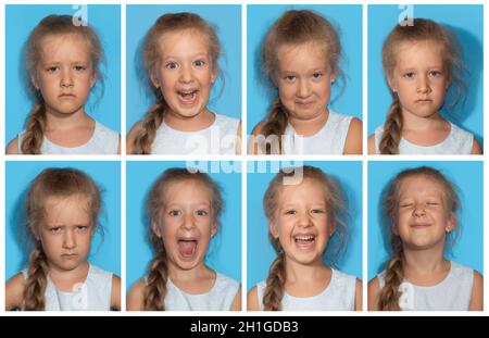 Le collage de fille avec des émotions différentes.Une jeune fille de sept ans posant dans un studio isolé sur fond bleu. Banque D'Images