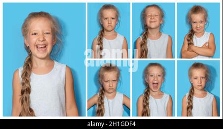 Le collage de fille avec des émotions différentes.Une jeune fille de sept ans posant dans un studio isolé sur fond bleu. Banque D'Images