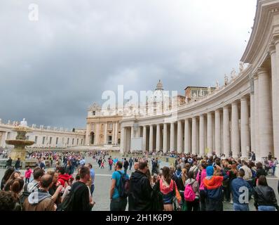 Vatican city, Italy - May 02, 2014: People standing in line at the entrance to the Cathedral of St. Peter Stock Photo