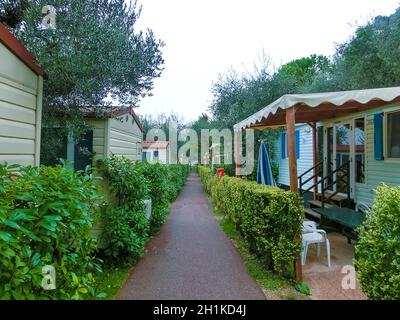 Bardolino, Italy - September 19, 2014: Beautiful view on camping site La Rocca in the morning light at Bardolino, Italy on September 19, 2014 Stock Photo