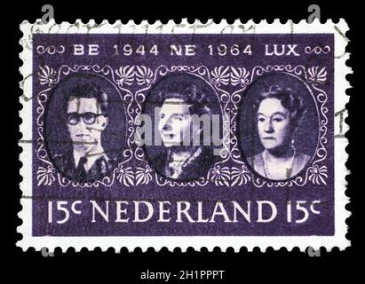 Stamp Imprimé aux Pays-Bas montre le Roi Baudouin, la reine Juliana et Grande-duchesse Charlotte, Benelux, vers 1964 Banque D'Images